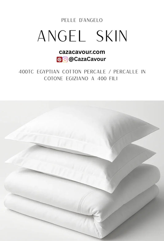 Stack of white Egyptian cotton percale bedding and pillows, 400 thread count.