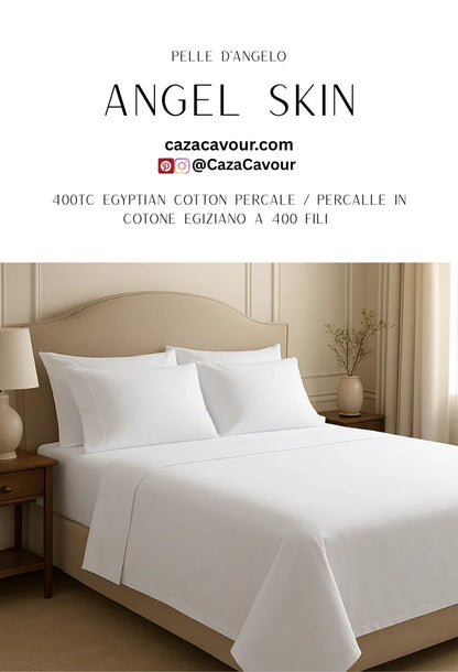 White 400 thread count Egyptian cotton percale bedding set on a neatly made bed in a serene bedroom