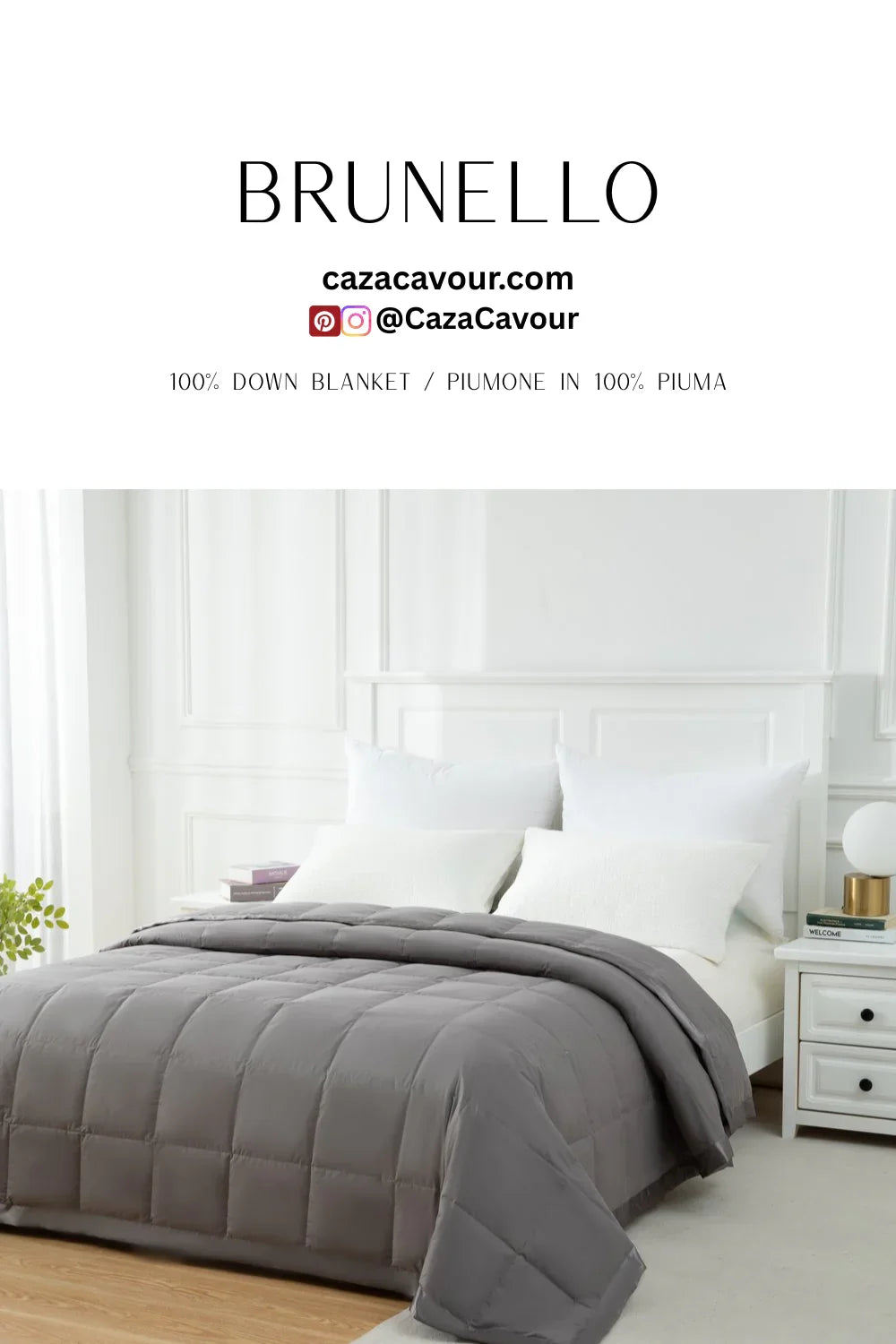 Gray down blanket on a neatly made bed with white pillows in a bright, modern bedroom