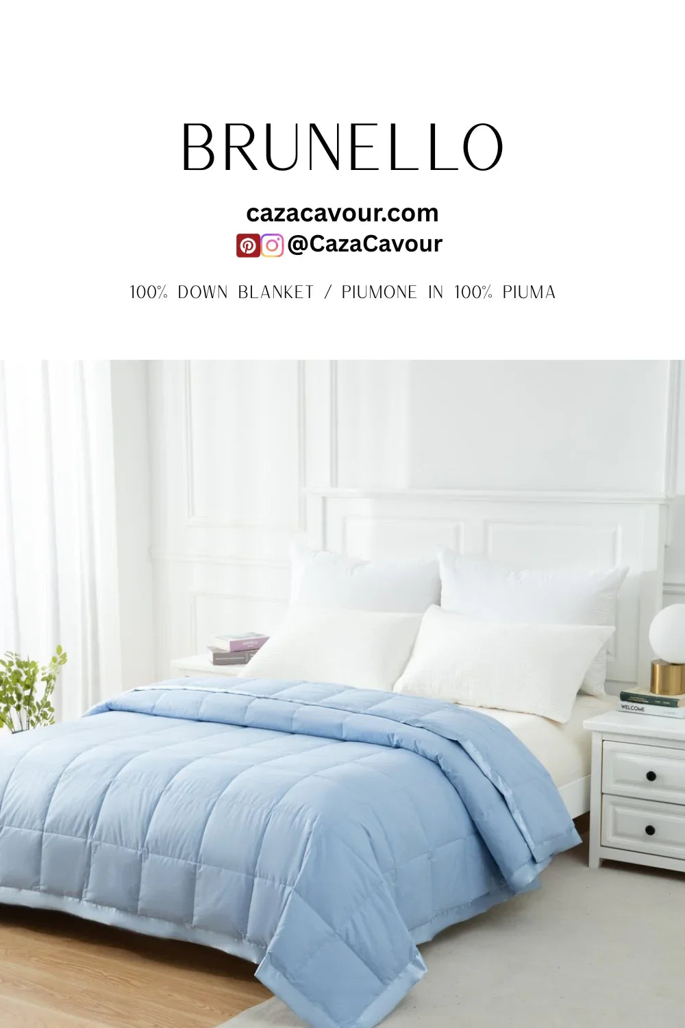 Light blue down blanket on a white bed in a bright, modern bedroom