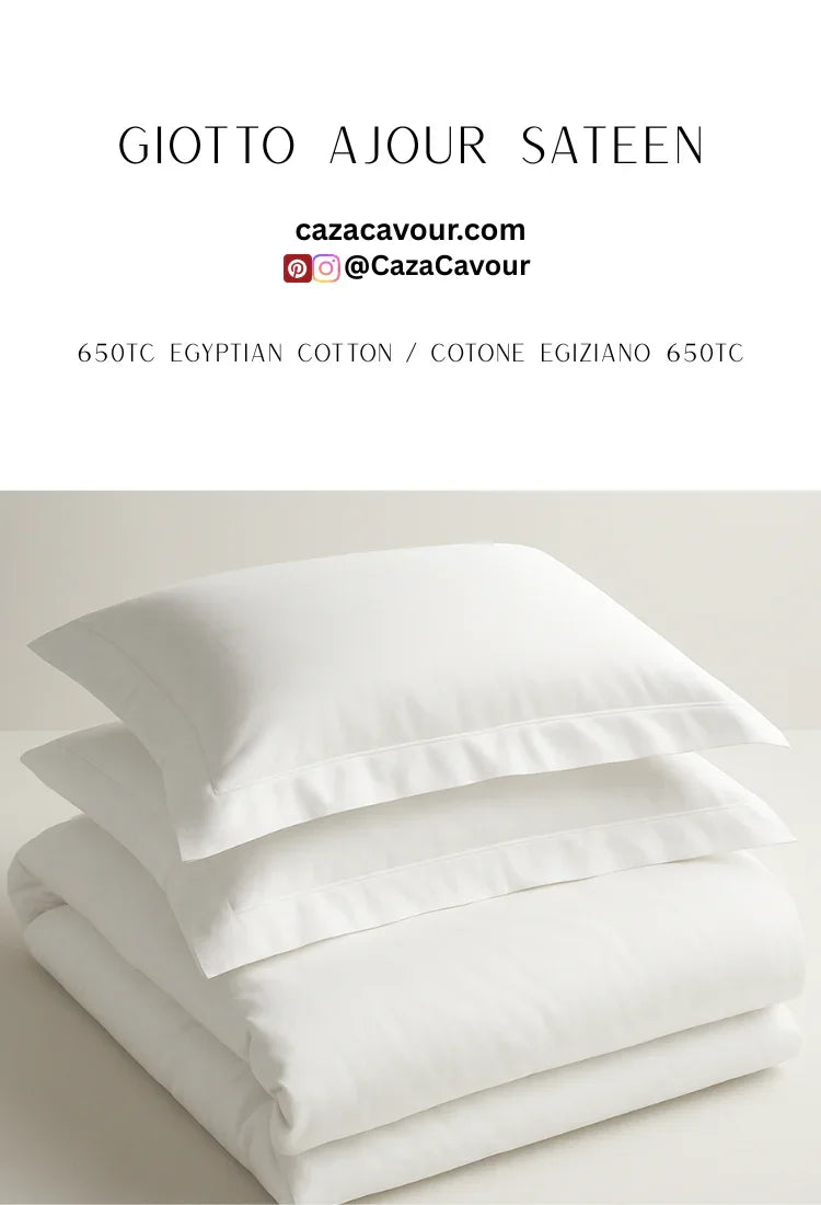 White Egyptian cotton sateen bedding set with two stacked pillows and folded duvet