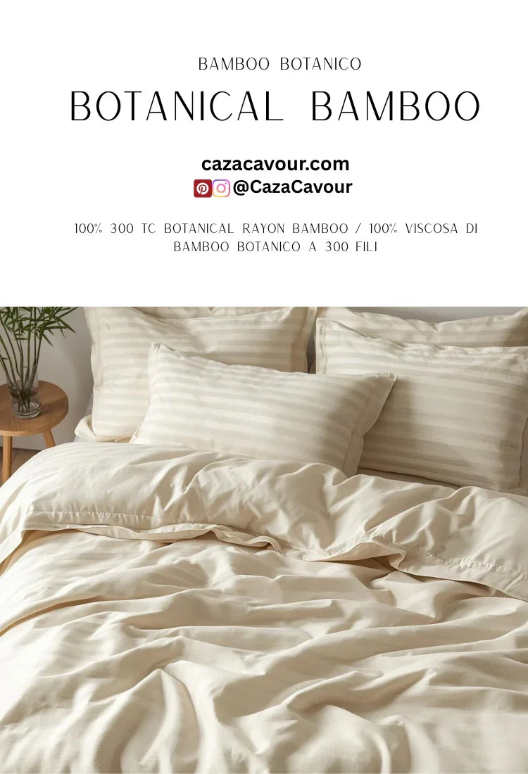 Cream bamboo botanical bedding set with striped pillows on a neatly made bed