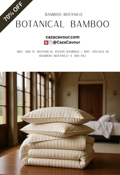 Stack of beige striped bamboo botanical bedding and pillows in a luxurious bedroom