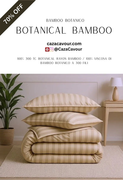 Striped botanical bamboo bedding set with pillows and comforter stacked on a beige rug, next to a plant and lamp