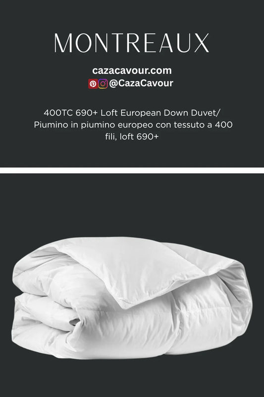 White European down duvet with 690+ loft and 400 thread count fabric on dark background