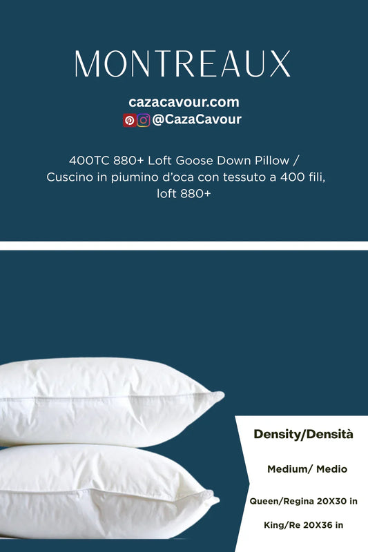 Two stacked white goose down pillows, 400 thread count, shown on a blue background.