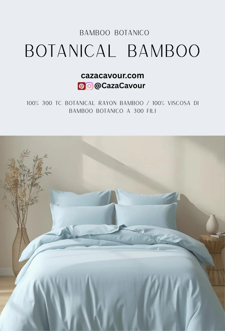 Light blue botanical bamboo bedding set on a bed in a modern, minimal bedroom with soft natural light.