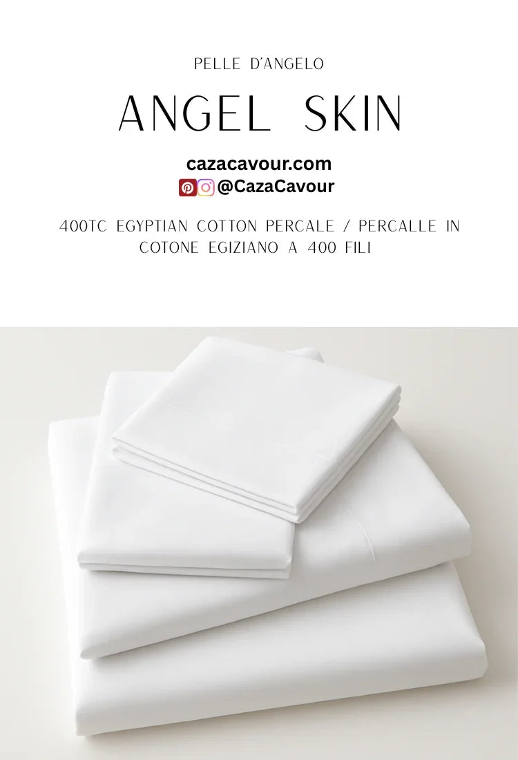 Stacked white 400 thread count Egyptian cotton percale bed sheets and pillowcases.