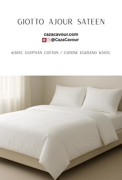 White Egyptian cotton sateen bedding set with two pillows on a modern bed in a bright room